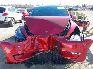 2024 Tesla Model Y Performance with VIN 7SAYGDEF3RF032980, listed as a IAAI auction lot 41619450 with 12,105 mi miles and . Bid and sale history available at DreamBid. Image 12.