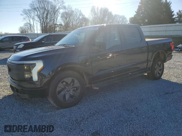 2024 Ford F-150 Lightning XLT with VIN 1FTVW3LK1RWG18473, listed as a Copart auction lot 86523084 with 6,824 mi miles and Salvage title. Bid and sale history available at DreamBid. Image 1.