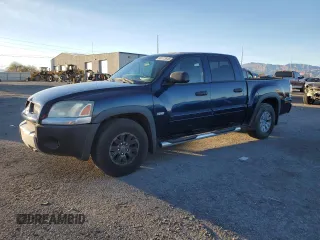 2006 Mitsubishi Raider Duro Cross with VIN 1Z7HC38K26S578751, listed as a Copart auction lot 46173615 with 107,371 mi miles and Salvage Title. Bid and sale history available at carsss.com. Image 1.