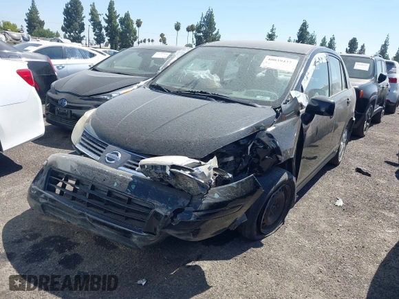 2009 Nissan Versa S with VIN 3N1BC11E19L440957, listed as a IAAI auction lot 40039437 with Not Provided miles and . Bid and sale history available at DreamBid. Image 2.