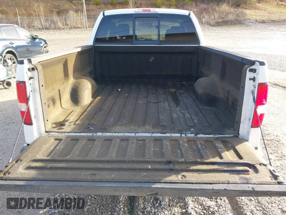 2005 Ford F-150 STX with VIN 1FTRX14W15NB34372, listed as a IAAI auction lot 41660412 with 104,086 mi miles. Bid and sale history available at carsss.com. Image 8.