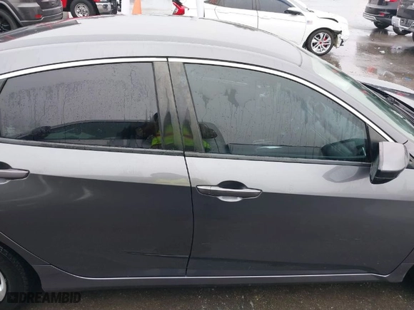 2018 Honda Civic Sedan LX with VIN 2HGFC2F59JH563823, listed as a IAAI auction lot 41449869 with 106,572 mi miles. Bid and sale history available at carsss.com. Image 14.