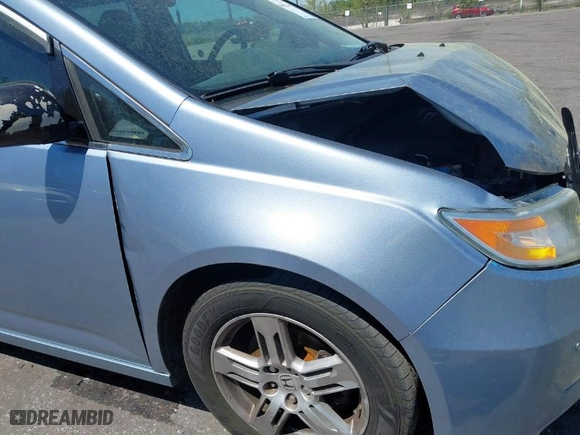 2013 Honda Odyssey Touring with VIN 5FNRL5H94DB069716, listed as a IAAI auction lot 41901369 with 243,492 mi miles. Bid and sale history available at carsss.com. Image 12.