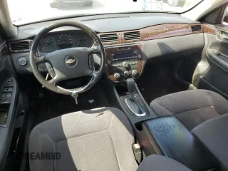 2014 Chevrolet Impala LS with VIN 2G1WA5E36E1183755, listed as a Copart auction lot 52616585 with 144,258 mi miles and Salvage Title. Bid and sale history available at DreamBid. Image 8.