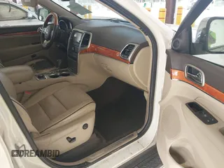 2011 Jeep Grand Cherokee Overland with VIN 1J4RR6GG0BC683624, listed as a IAAI auction lot 42729697 with 212,739 mi miles and . Bid and sale history available at DreamBid. Image 5.
