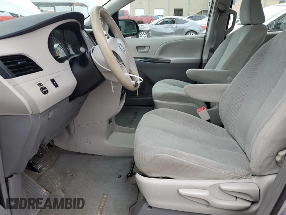 2012 Toyota Sienna with VIN 5TDKA3DC2CS010056, listed as a Copart auction lot 44639505 with 146,195 mi miles and Salvage Title. Bid and sale history available at DreamBid. Image 7.
