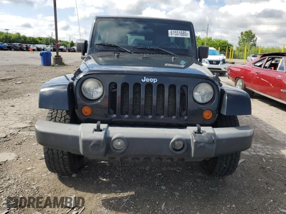 2007 Jeep Wrangler Unlimited Sahara with VIN 1J4GA59197L121262, listed as a Copart auction lot 61551685 with 233,309 mi miles and Clean title. Bid and sale history available at DreamBid. Image 5.