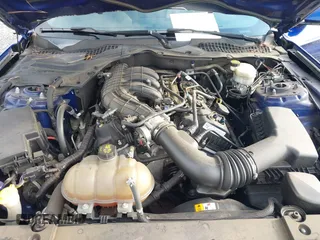 2015 Ford Mustang V6 z VIN 1FA6P8AM6F5411572, wystawiony jako IAAI lot #42377268 z przebiegiem 56 049 mil mil oraz . Historia ofert i sprzedaży dostępna na DreamBid. Obrazek 10.