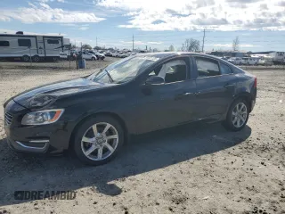 2014 Volvo S60 T5 z VIN YV1612FS0E2295344, wystawiony jako Copart lot #50101125 z przebiegiem 75 959 mil mil oraz Szkody całkowita. Historia ofert i sprzedaży dostępna na DreamBid. Obrazek 1.