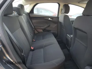2017 Ford Focus SE z VIN 1FADP3F25HL331714, wystawiony jako Copart lot #77389764 z przebiegiem 49 953 mil mil oraz Szkoda całkowita • Salvage title. Historia ofert i sprzedaży dostępna na DreamBid. Obrazek 10.