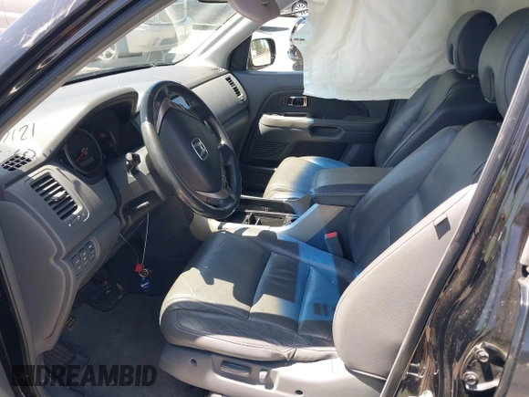 2008 Honda Pilot EX-L with VIN 5FNYF28728B020701, listed as a IAAI auction lot 42551294 with 136,860 mi miles and . Bid and sale history available at DreamBid. Image 5.