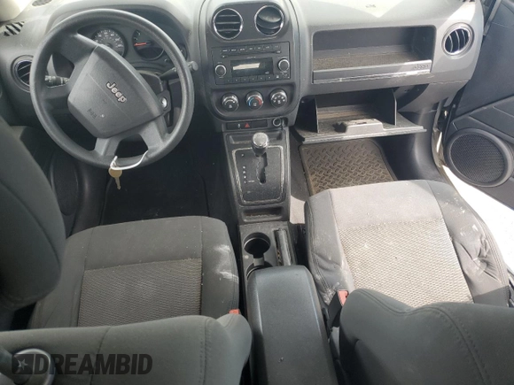 2010 Jeep Patriot Sport with VIN 1J4NF2GB4AD521492, listed as a Copart auction lot 48303095 with 0 mi miles and Salvage Title. Bid and sale history available at carsss.com. Image 8.