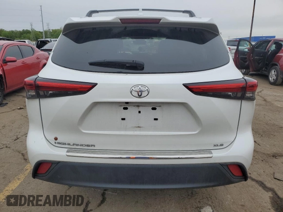 2023 Toyota Highlander L with VIN 5TDKDRAH4PS049246, listed as a Copart auction lot 57025305 with 9,848 mi miles and Salvage title. Bid and sale history available at DreamBid. Image 6.