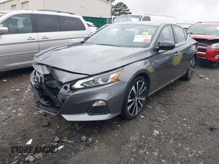 2022 Nissan Altima SR with VIN 1N4BL4CV8NN309083, listed as a IAAI auction lot 41720996 with 74,719 mi miles and . Bid and sale history available at DreamBid. Image 2.