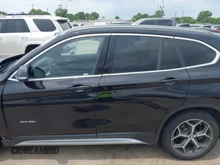 2017 BMW X1 xDrive28i with VIN WBXHT3Z34H4A53528, listed as a IAAI auction lot 42429800 with 75,986 mi miles and . Bid and sale history available at DreamBid. Image 14.