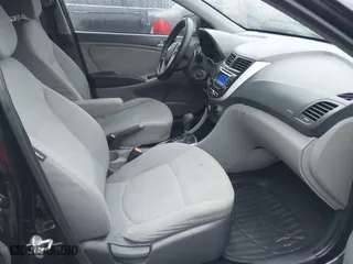 2013 Hyundai Accent GL with VIN KMHCT5AE4DU138789, listed as a IAAI auction lot 41536803 with 162,212 mi miles. Bid and sale history available at carsss.com. Image 5.