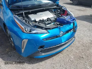 2022 Toyota Prius L Eco with VIN JTDKAMFU5N3165006, listed as a IAAI auction lot 41753470 with 33,567 mi miles and . Bid and sale history available at DreamBid. Image 6.