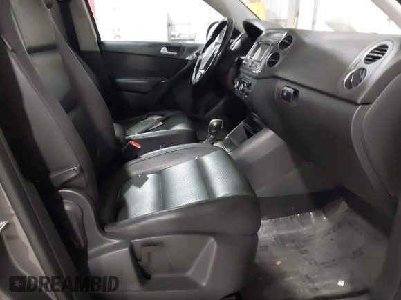 2012 Volkswagen Tiguan S with VIN WVGBV7AX2CW002991, listed as a IAAI auction lot 42031877 with 205,979 mi miles and . Bid and sale history available at DreamBid. Image 5.