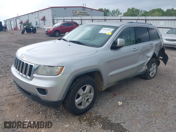 2011 Jeep Grand Cherokee Laredo with VIN 1J4RS4GGXBC564035, listed as a IAAI auction lot 41931861 with 242,291 mi miles and . Bid and sale history available at DreamBid. Image 2.