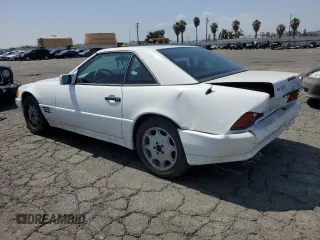1994 Mercedes-Benz SL with VIN WDBFA63E8RF100874, listed as a Copart auction lot 59604935 with 146,006 mi miles and Salvage title. Bid and sale history available at DreamBid. Image 2.