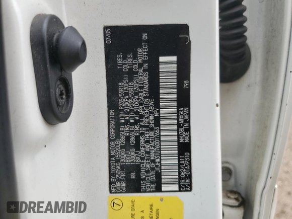 2006 Lexus RX 400h with VIN JTJHW31U760017663, listed as a Copart auction lot 58239885 with 195,120 mi miles and Salvage title. Bid and sale history available at DreamBid. Image 12.