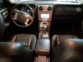 2009 Lincoln MKZ z VIN 3LNHM28T09R606344, wystawiony jako Copart lot #56650495 z przebiegiem 151 144 mil mil oraz Szkoda całkowita • Salvage title. Historia ofert i sprzedaży dostępna na DreamBid. Obrazek 8.