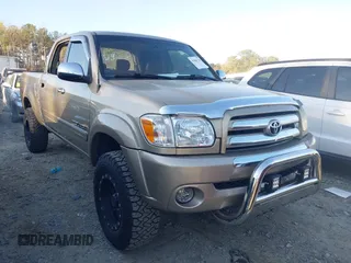 2006 Toyota Tundra SR5 with VIN 5TBET34196S519709, listed as a IAAI auction lot 41880138 with 325,523 mi miles. Bid and sale history available at carsss.com. Image 1.