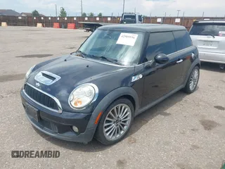 2008 MINI Hardtop S with VIN WMWMF73528TV34513, listed as a IAAI auction lot 42505556 with 72,848 mi miles and . Bid and sale history available at DreamBid. Image 2.