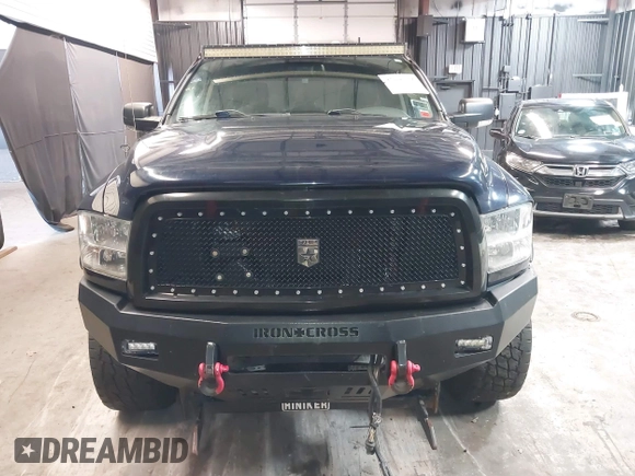 2013 Ram 2500 SLT z VIN 3C6TR5JT1DG566895, wystawiony jako IAAI lot #42096955 z przebiegiem 168 454 mil mil oraz . Historia ofert i sprzedaży dostępna na DreamBid. Obrazek 6.