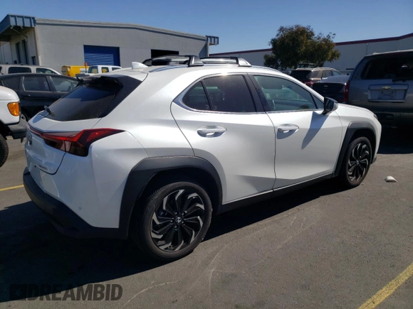 2024 Lexus UX with VIN JTHX6JBH3R2187983, listed as a Copart auction lot 73429324 with 14,549 mi miles and Salvage Title. Bid and sale history available at carsss.com. Image 3.