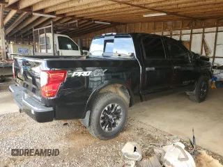 2018 Nissan Titan Pro-4X z VIN 1N6AA1E51JN531463, wystawiony jako Copart lot #52995885 z przebiegiem 62 873 mil mil oraz Szkoda całkowita • Salvage title. Historia ofert i sprzedaży dostępna na DreamBid. Obrazek 3.