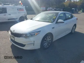 2016 Kia Optima EX with VIN 5XXGU4L32GG070138, listed as a IAAI auction lot 42138810 with 131,040 mi miles. Bid and sale history available at carsss.com. Image 2.