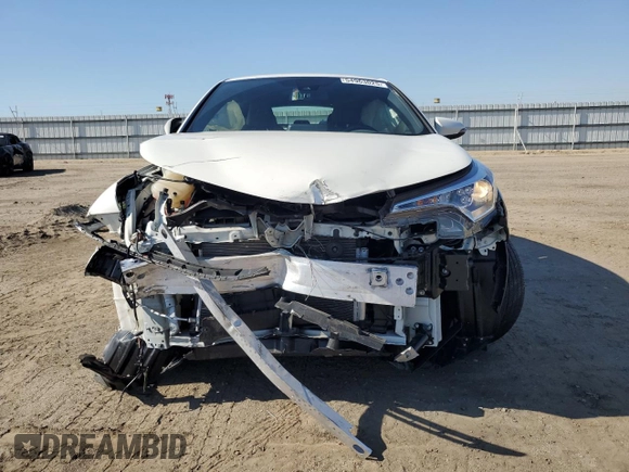 2019 Toyota C-HR XLE with VIN JTNKHMBX1K1014761, listed as a Copart auction lot 54963025 with 15,890 mi miles and Salvage Title. Bid and sale history available at DreamBid. Image 5.