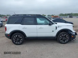 2024 Ford Bronco Sport Outer Banks z VIN 3FMCR9C67RRE17020, wystawiony jako IAAI lot #41866241 z przebiegiem 13 037 mil mil oraz . Historia ofert i sprzedaży dostępna na DreamBid. Obrazek 13.