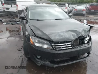 2014 Volkswagen Passat Wolfsburg Edition with VIN 1VWAS7A37EC119540, listed as a IAAI auction lot 40887749 with 98,558 mi miles and . Bid and sale history available at DreamBid. Image 1.