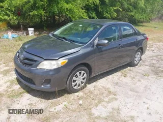 2011 Toyota Corolla L with VIN 2T1BU4EE0BC680158, listed as a IAAI auction lot 42060987 with 131,669 mi miles. Bid and sale history available at carsss.com. Image 17.