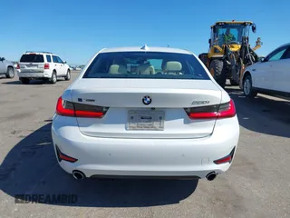 2021 BMW 3 Series 330i xDrive with VIN WBA5R7C0XMFK54525, listed as a IAAI auction lot 42320181 with 54,576 mi miles and . Bid and sale history available at DreamBid. Image 16.