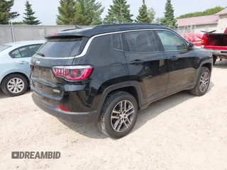 2017 Jeep Compass Latitude with VIN 3C4NJDBBXHT616909, listed as a IAAI auction lot 42457501 with 110,326 mi miles and . Bid and sale history available at DreamBid. Image 4.