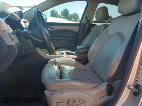 2014 Cadillac SRX Luxury Collection with VIN 3GYFNBE33ES547803, listed as a Copart auction lot 55112385 with 136,123 mi miles and Clean Title. Bid and sale history available at carsss.com. Image 7.