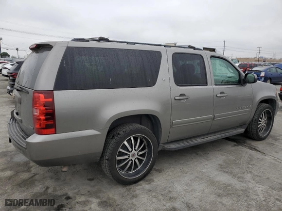 2009 Chevrolet Suburban LT w/2LT with VIN 1GNFC26069R266658, listed as a Copart auction lot 50842325 with 202,852 mi miles and Clean Title. Bid and sale history available at carsss.com. Image 3.