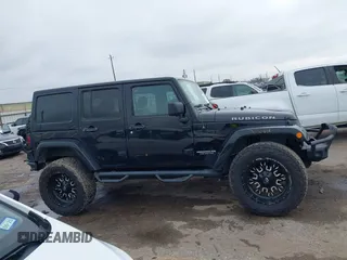 2017 Jeep Wrangler Unlimited Rubicon Recon z VIN 1C4HJWFG9HL592824, wystawiony jako IAAI lot #41427433 z przebiegiem 70 105 mil mil oraz . Historia ofert i sprzedaży dostępna na DreamBid. Obrazek 14.