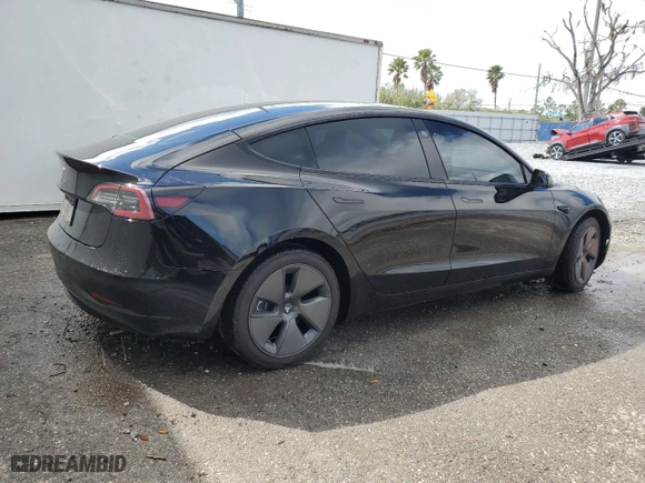 2022 Tesla Model 3 with VIN 5YJ3E1EA9NF332355, listed as a Copart auction lot 46068405 with 58,049 mi miles and Salvage Title. Bid and sale history available at carsss.com. Image 3.