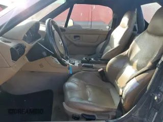 2001 BMW Z3 3.0i with VIN WBACN53421LL47532, listed as a Copart auction lot 86485874 with 140,590 mi miles and Salvage Title. Bid and sale history available at carsss.com. Image 7.