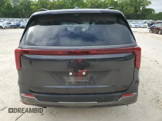 2025 Kia Carnival SX with VIN KNDNE5K37S6490478, listed as a Copart auction lot 51389565 with 6,929 mi miles and Salvage Title. Bid and sale history available at DreamBid. Image 6.