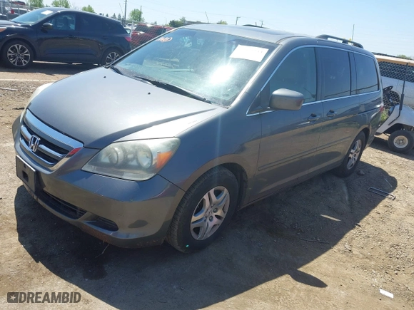 2007 Honda Odyssey EX-L with VIN 5FNRL38797B137595, listed as a IAAI auction lot 42002233 with 192,296 mi miles. Bid and sale history available at carsss.com. Image 17.