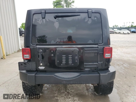 2014 Jeep Wrangler Unlimited Rubicon X with VIN 1C4HJWFG0EL142071, listed as a Copart auction lot 56187575 with 110,597 mi miles and Salvage title. Bid and sale history available at DreamBid. Image 6.