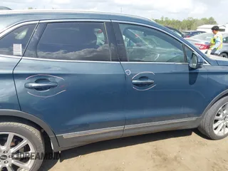 2019 Lincoln MKC Reserve with VIN 5LMCJ3C94KUL22859, listed as a IAAI auction lot 41963707 with 123,299 mi miles and . Bid and sale history available at DreamBid. Image 14.
