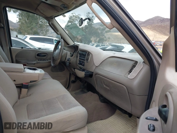2003 Ford F-150 XLT with VIN 1FTRW07623KD34295, listed as a IAAI auction lot 41515387 with 163,506 mi miles. Bid and sale history available at carsss.com. Image 5.