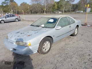 1995 Ford Thunderbird LX with VIN 1FALP62WXSH147871, listed as a IAAI auction lot 41878652 with 95,305 mi miles. Bid and sale history available at carsss.com. Image 2.