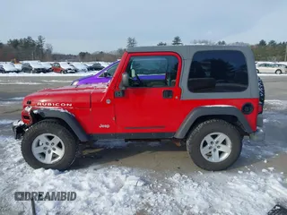 2005 Jeep Wrangler Rubicon with VIN 1J4FA69S25P316085, listed as a IAAI auction lot 41503034 with 57,252 mi miles. Bid and sale history available at carsss.com. Image 14.